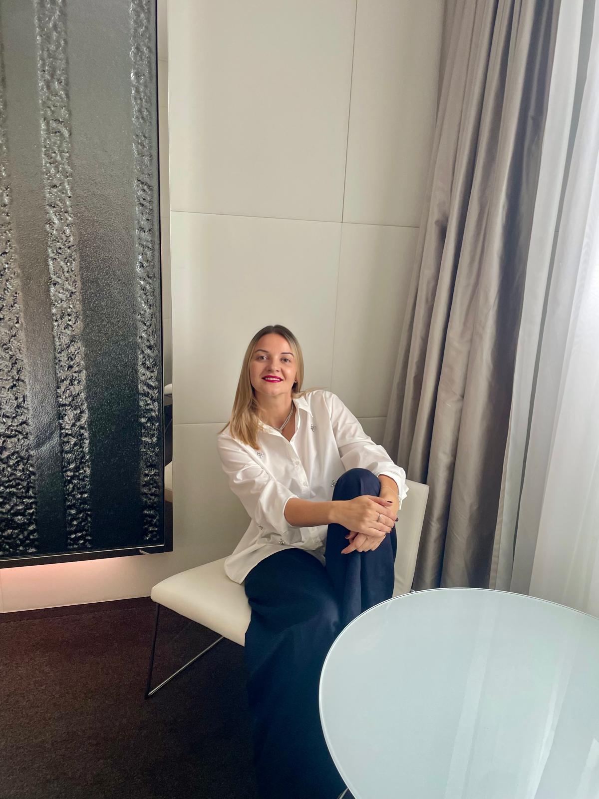 Kristina Culka seated in a calm private room for reflective work