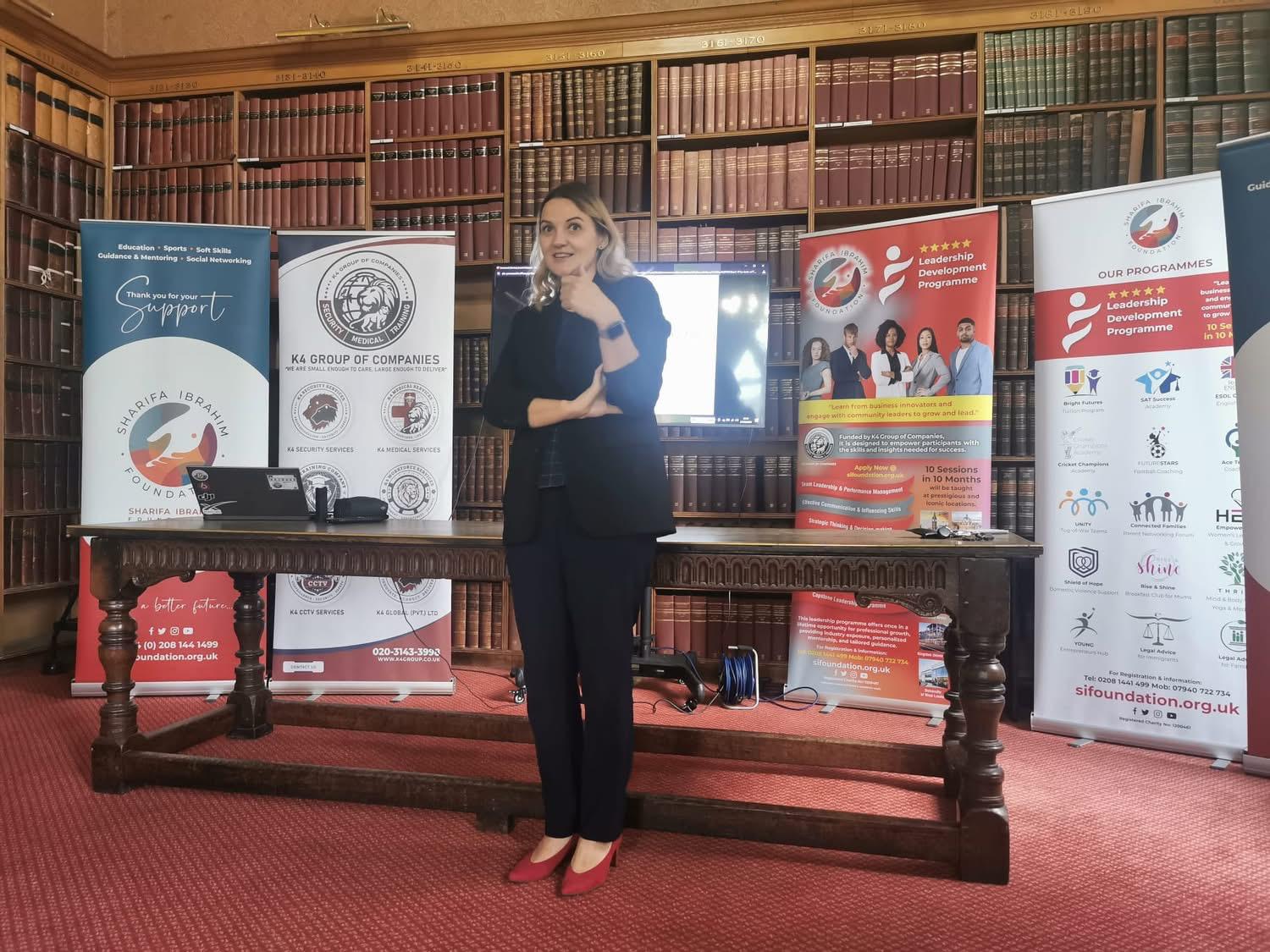 Kristina Culka presenting in a law library for a charity leadership development programme