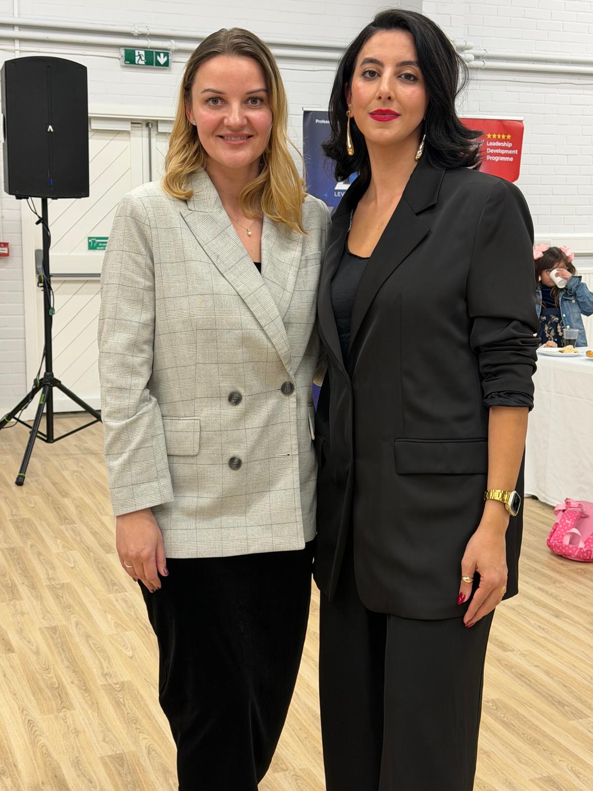 Kristina Culka with a community partner at a charity event