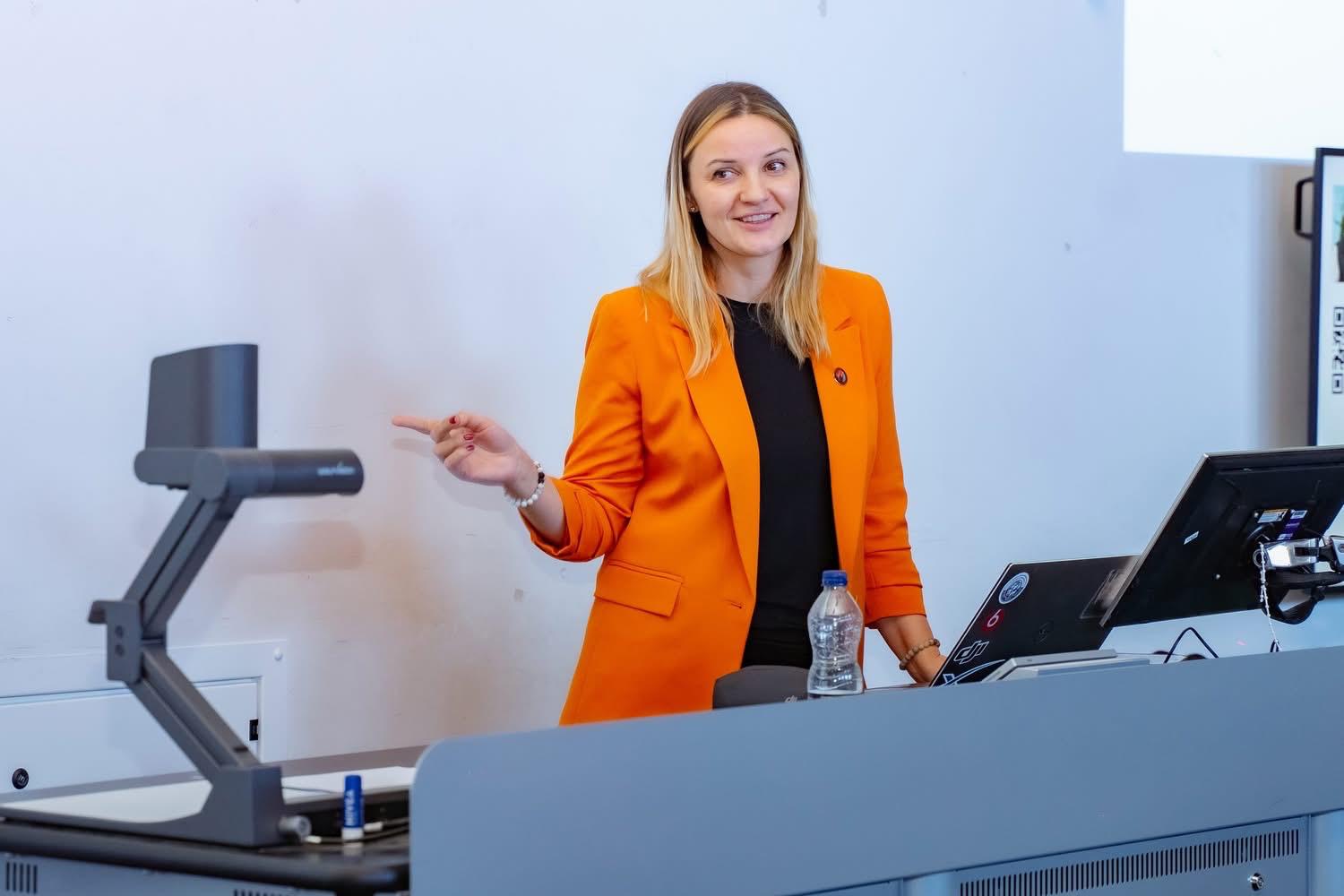 Kristina Culka teaching confidence and clear communication in a lecture room